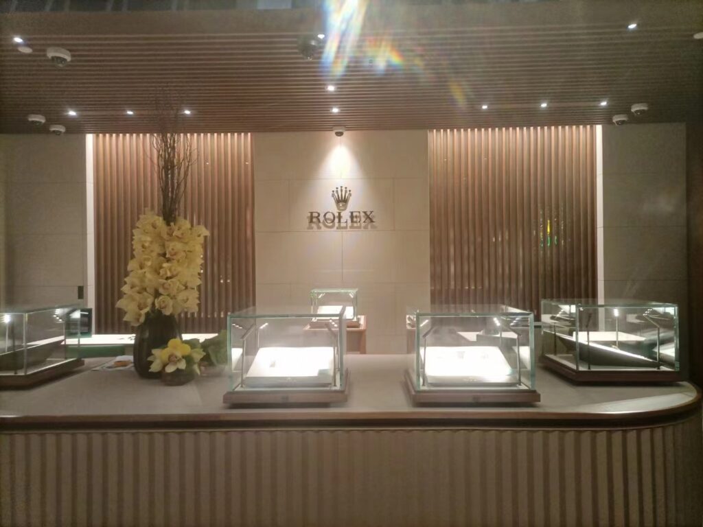 ROLEX store interior - luxury watch display showcases in the store
