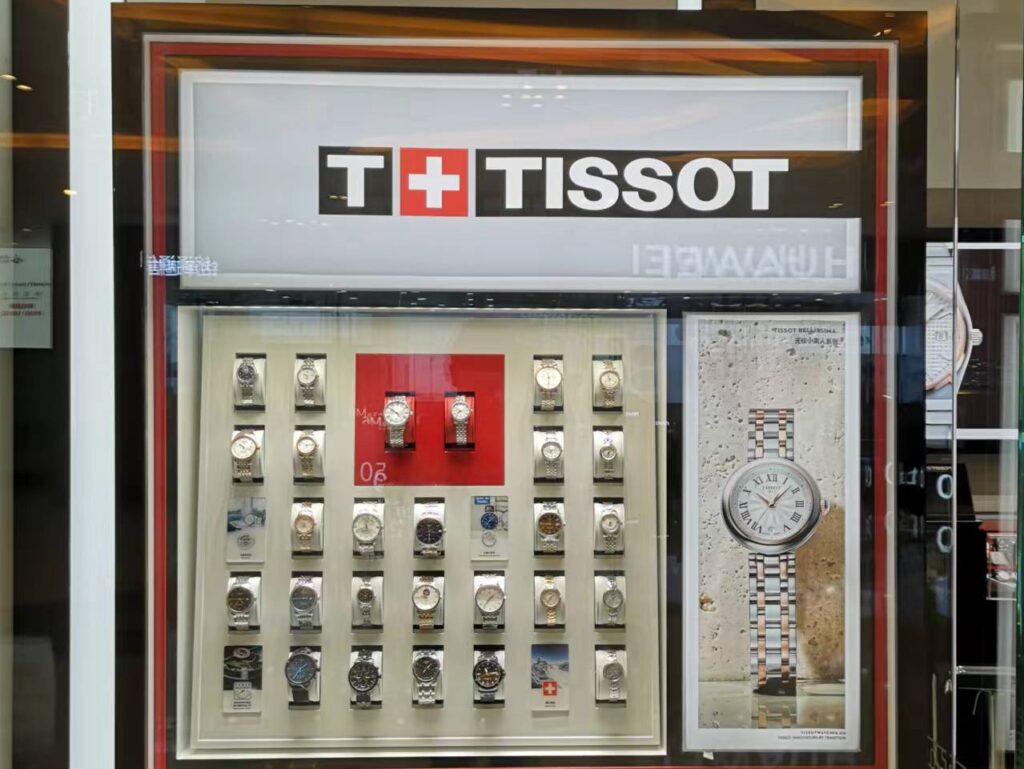 TISSOT store interior - luxury watch display showcases in the store