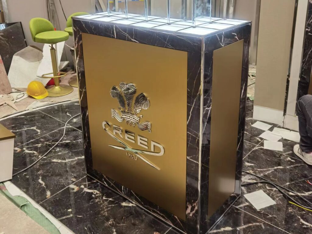 CREED store interior - luxury perfume display showcases in the store