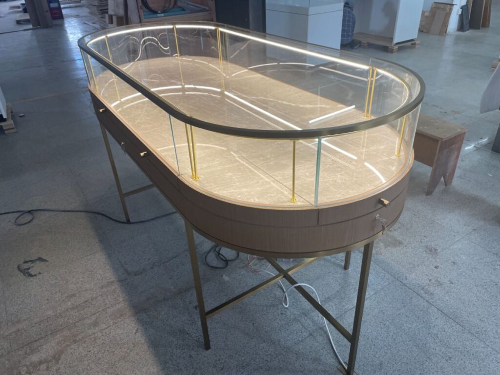 curved glass jewelry display cabinet with illuminated