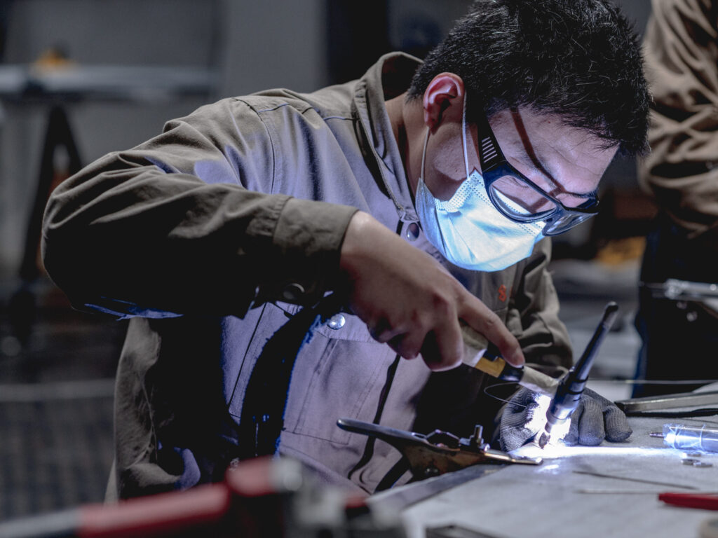 Shop Fitting Manufacturing Process: Welding post banner