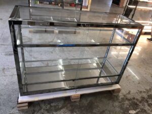 mirror finished stainless steel with glass display showcase