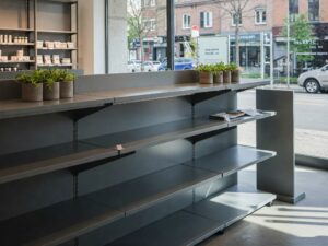 A modern retail store interior with powder-coated steel fixtures